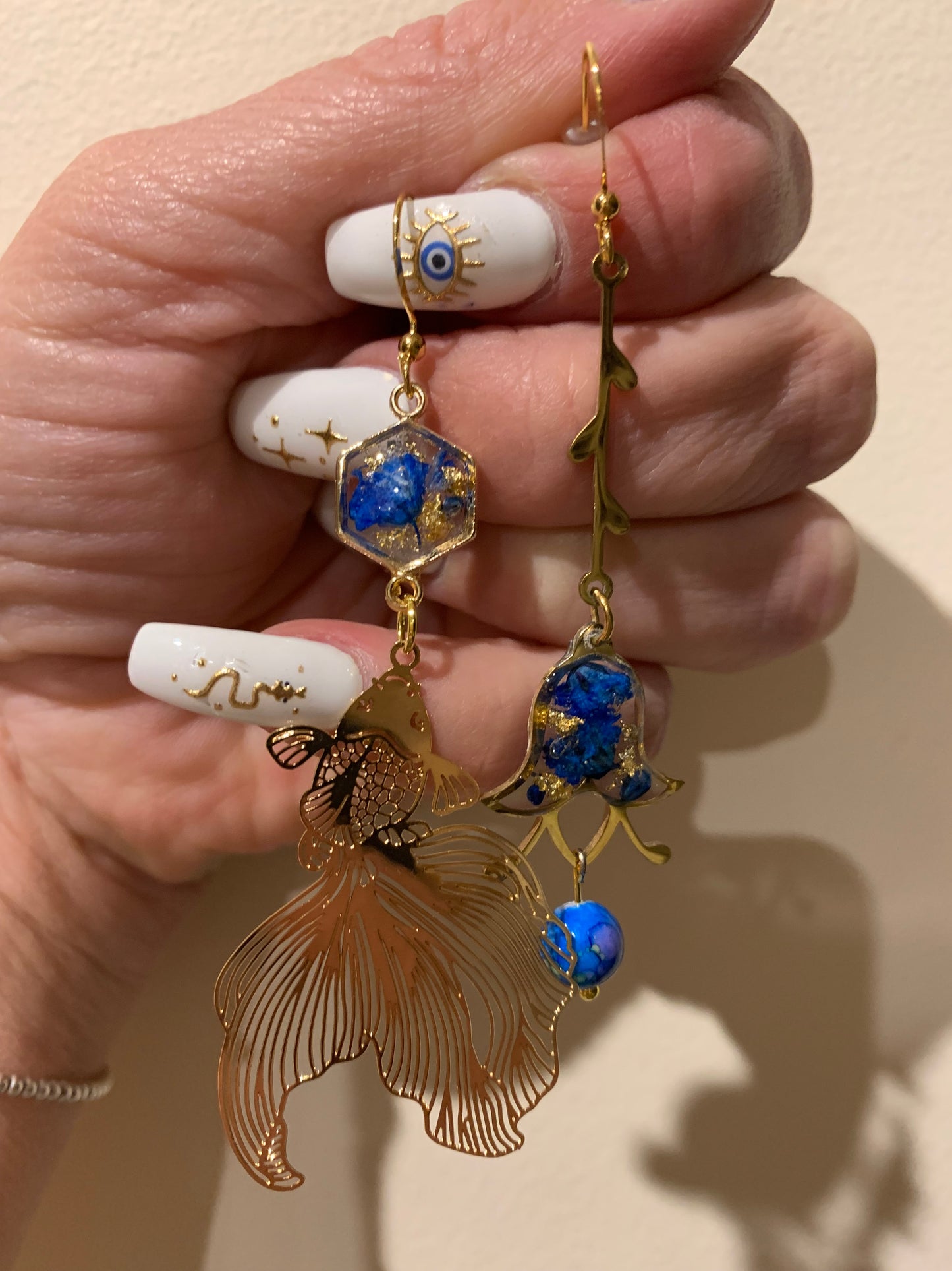 Floral fish earrings